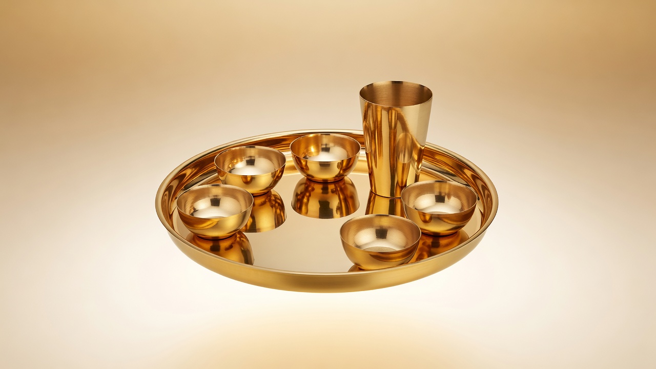 Ram Metals golden brass thaali set with katoris and a tumbler